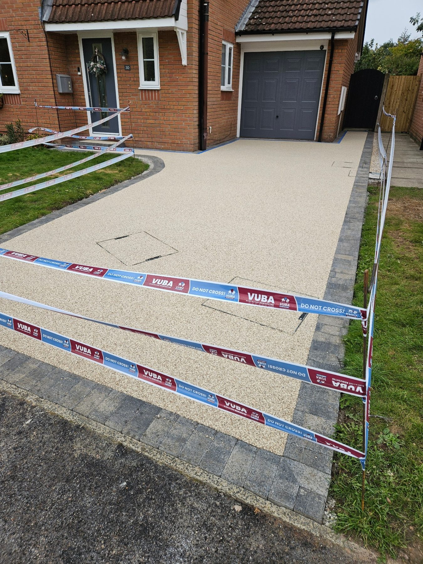 Resin driveway with block border, curing